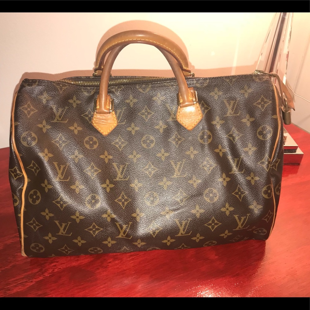 Louis Vuitton Speedy 35 lock Monogram Canvas